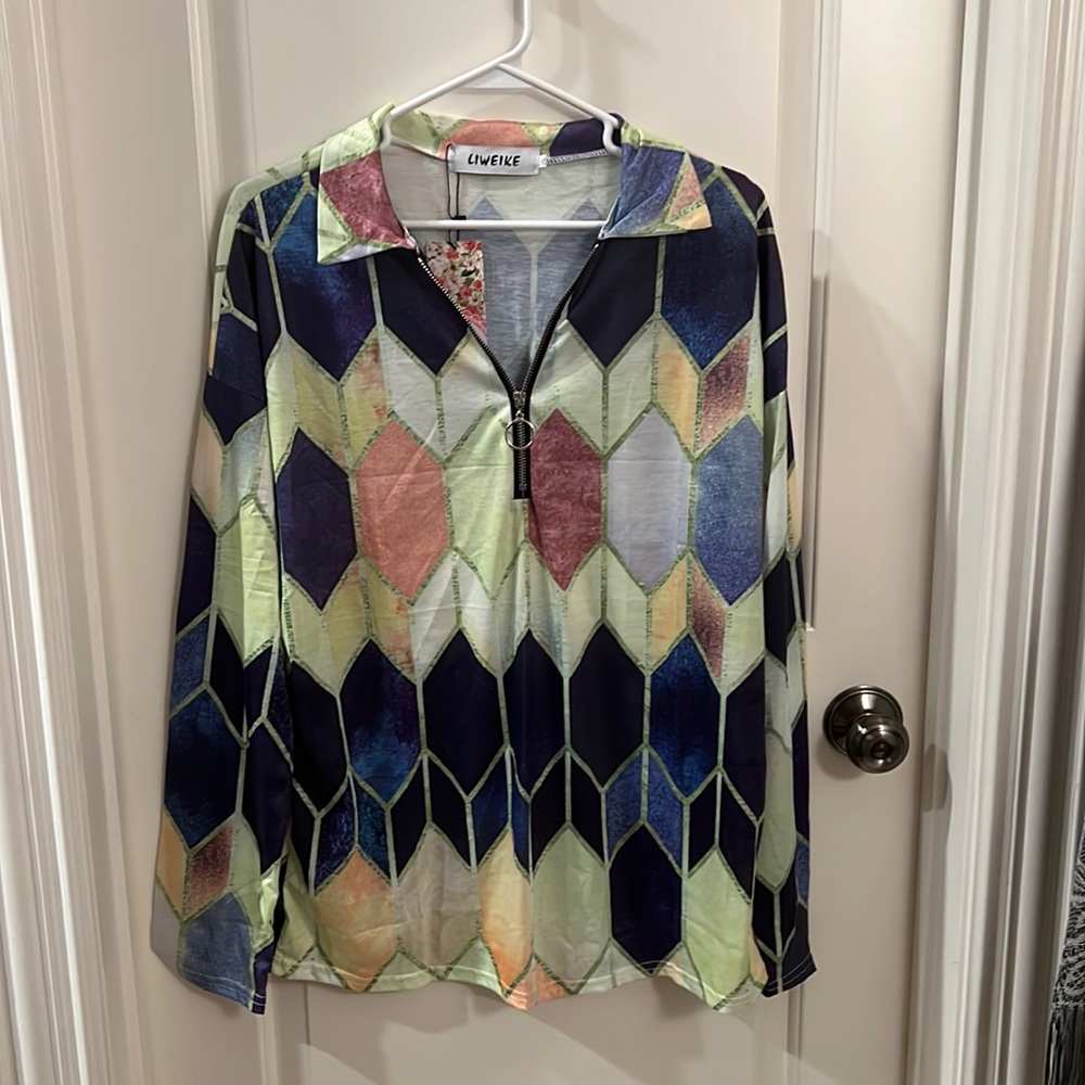 Lieweike Chinese designer, notched zip up collar blouse.